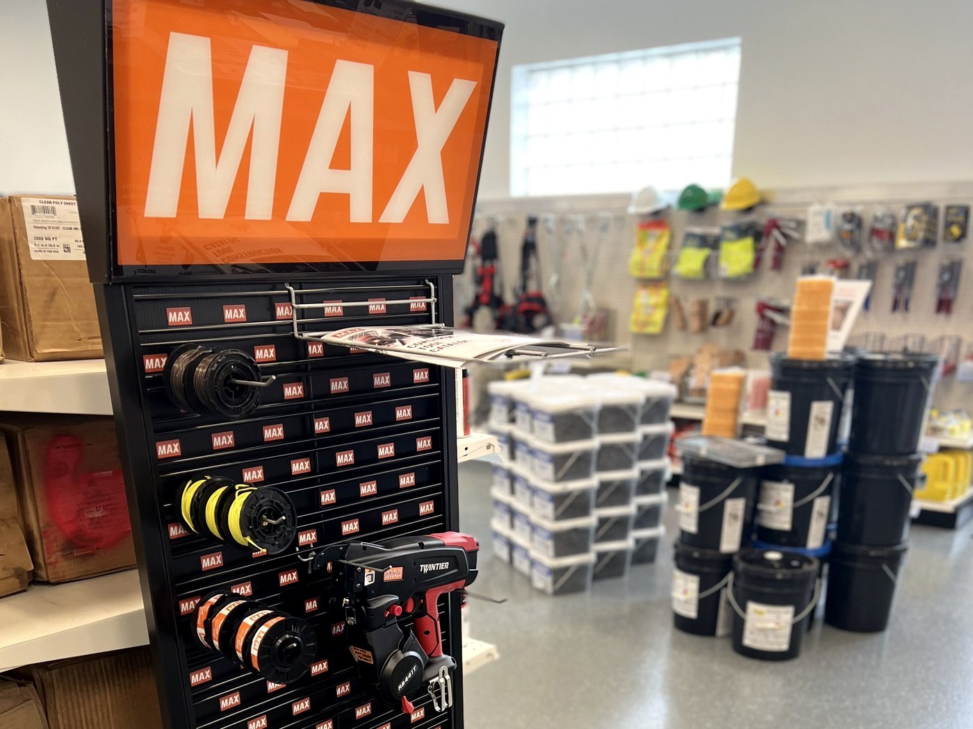 MAX TwinTier rebar tying guns and tie wire display with concrete accessories at RC Supply Corp in Freeport NY