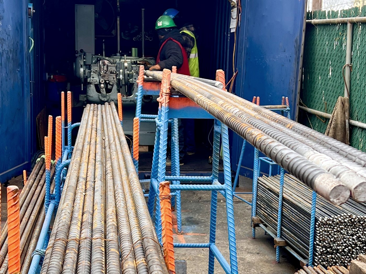 Large-diameter rebar being threaded on the machine at RC Supply Corp in Freeport NY